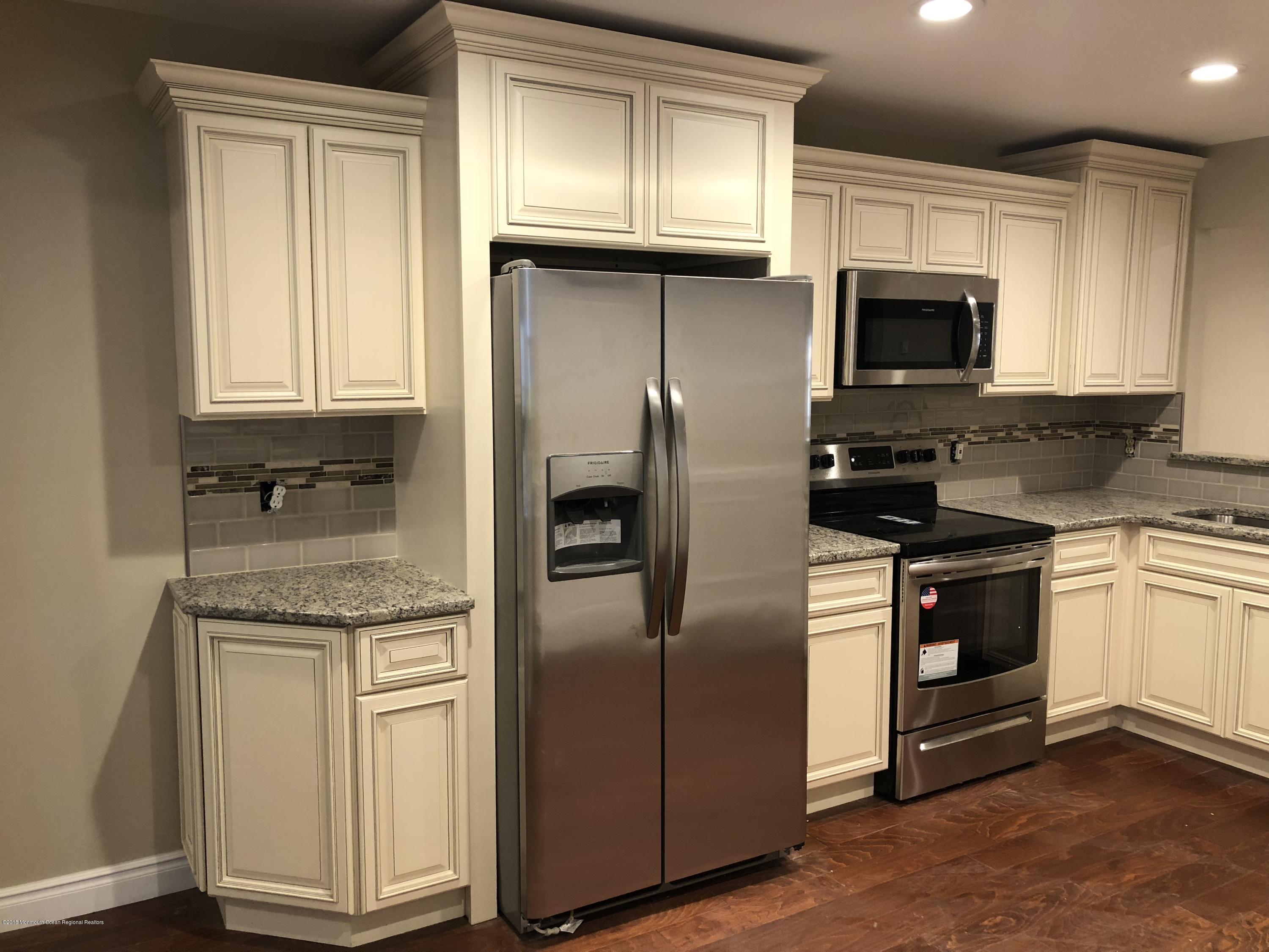 92 East Halls Croft Road, Unit 1000 Freehold, NJ 07728 - Photo 5 of 21 IMG_5441
