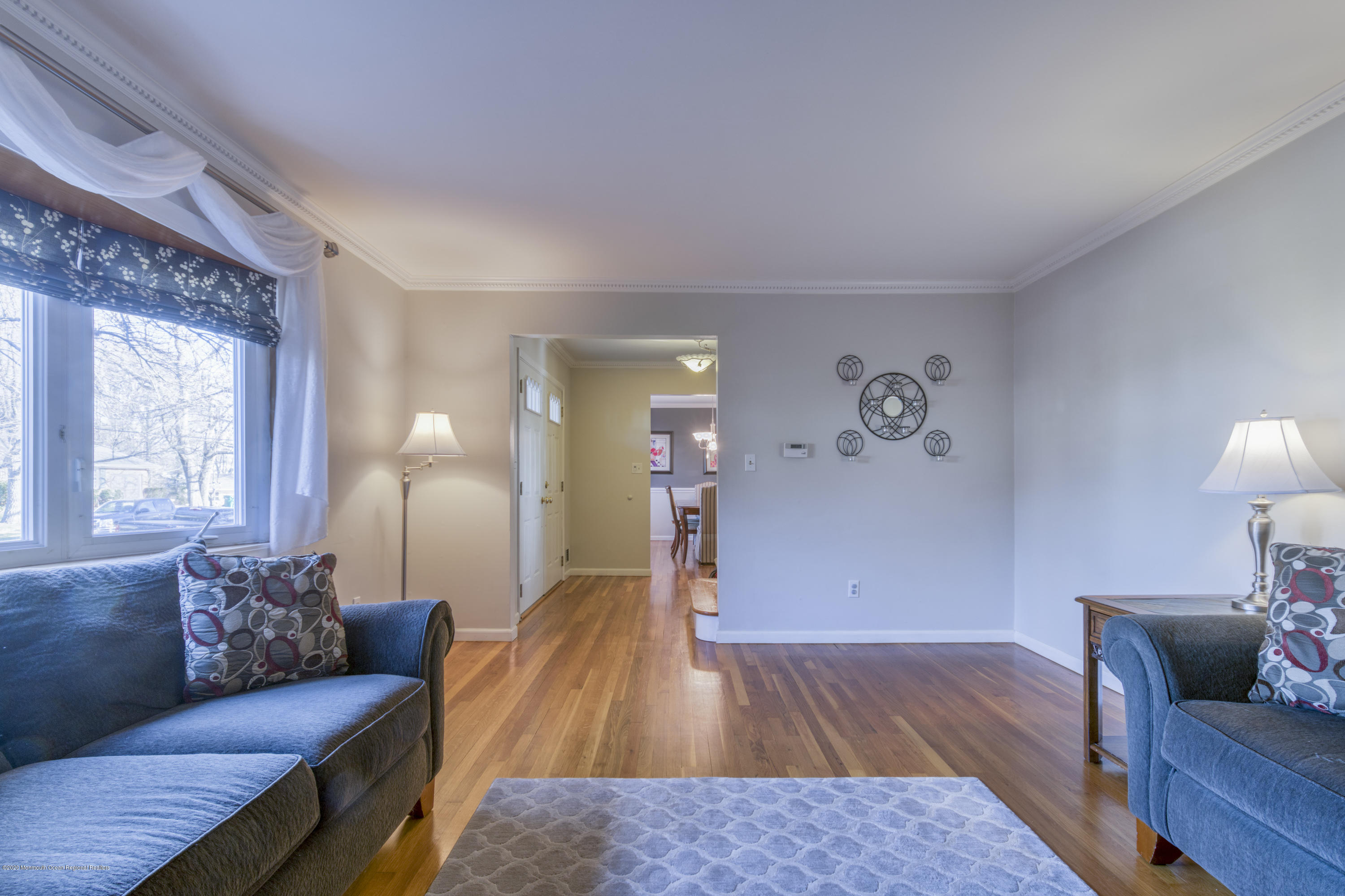 5 Lexington Road Howell, NJ 07731 - Photo 3 of 35 a living room with furniture and a wooden floor