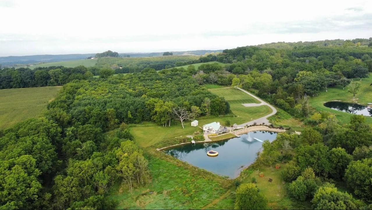 1 East Hoffman Road Elizabeth, IL 61028 - Photo 66 of 76 an aerial view of a residential houses with outdoor space and trees all around