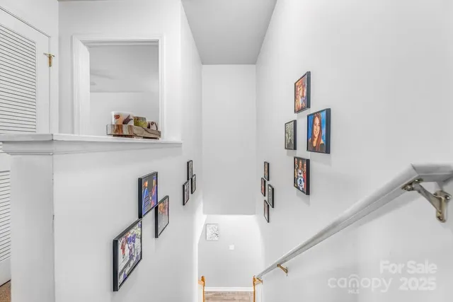 a spacious bedroom with a bed and a couch