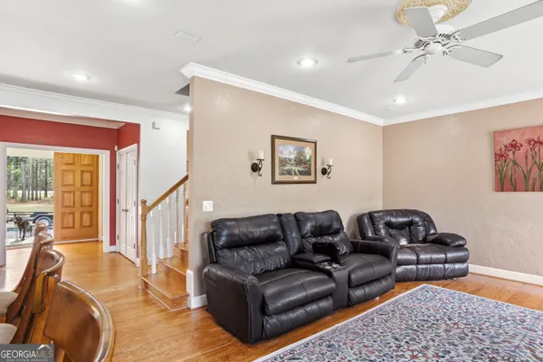 a kitchen with stainless steel appliances granite countertop a stove a refrigerator and a refrigerator