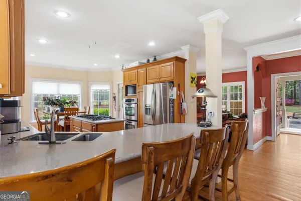 a view of a living room and dining room