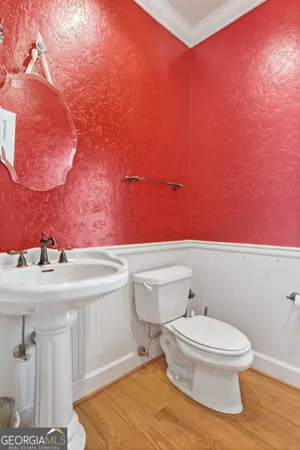 a bathroom with a sink double vanity and a mirror
