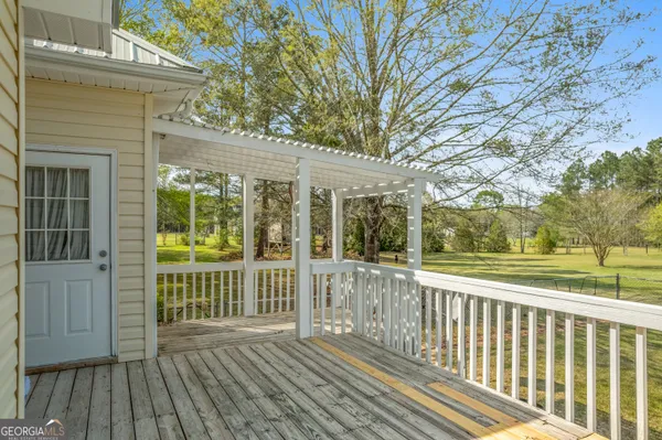 a view of a house with a deck
