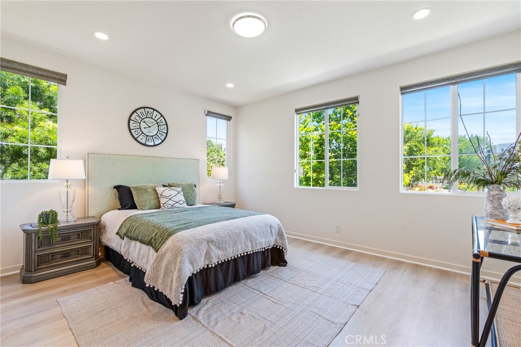747 Beacon Irvine, CA 92618 - Photo 12 of 28 a bedroom with a bed and a window