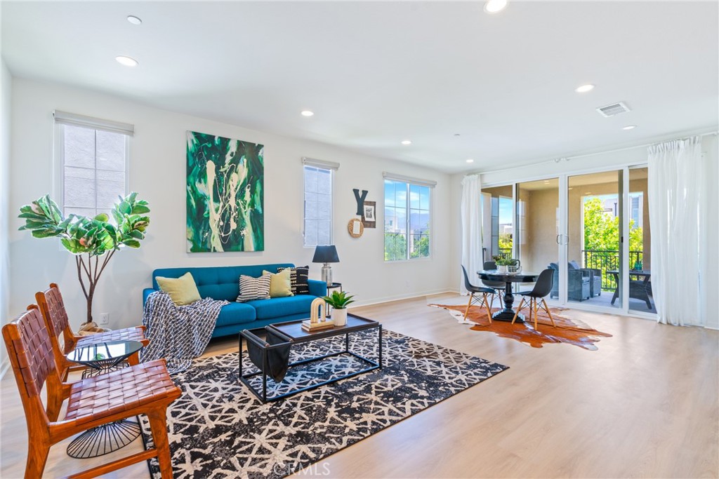 747 Beacon Irvine, CA 92618 - Photo 16 of 28 a living room with furniture and a window