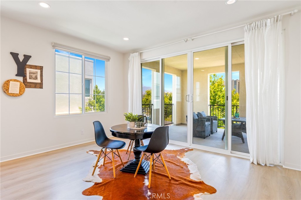 747 Beacon Irvine, CA 92618 - Photo 17 of 28 a work room with furniture and wooden floor