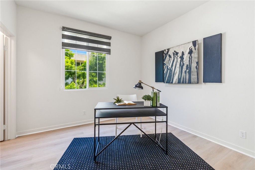 747 Beacon Irvine, CA 92618 - Photo 9 of 28 a workspace with furniture and a window