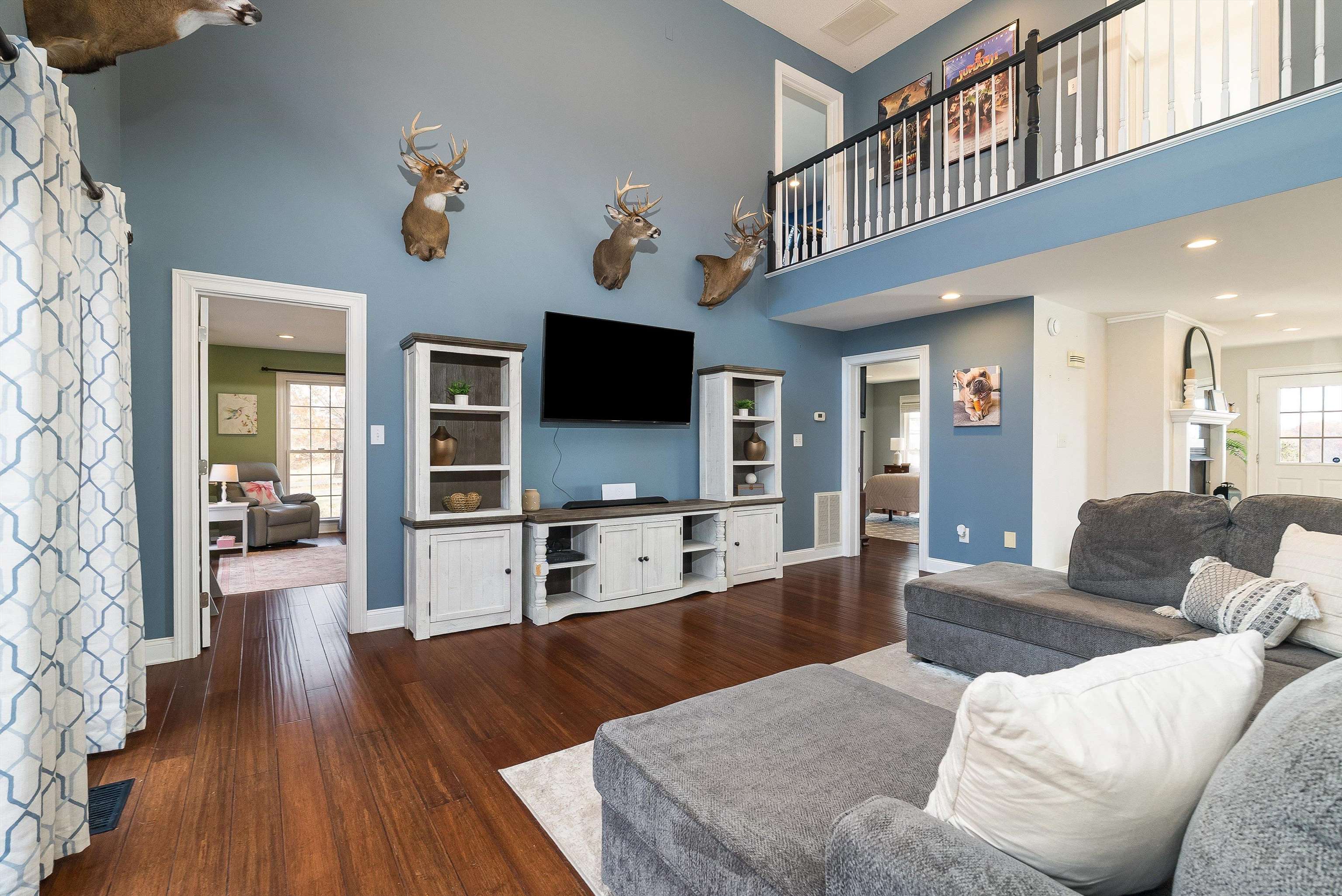 746 Christians Creek Road Staunton, VA 24401 - Photo 27 of 60 a living room with furniture and a flat screen tv