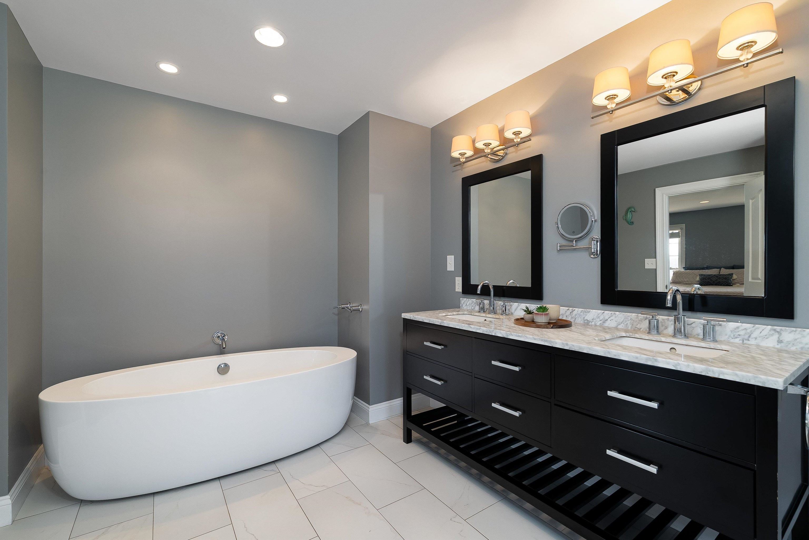 746 Christians Creek Road Staunton, VA 24401 - Photo 32 of 60 a spacious bathroom with a double vanity sink mirror and a bathtub