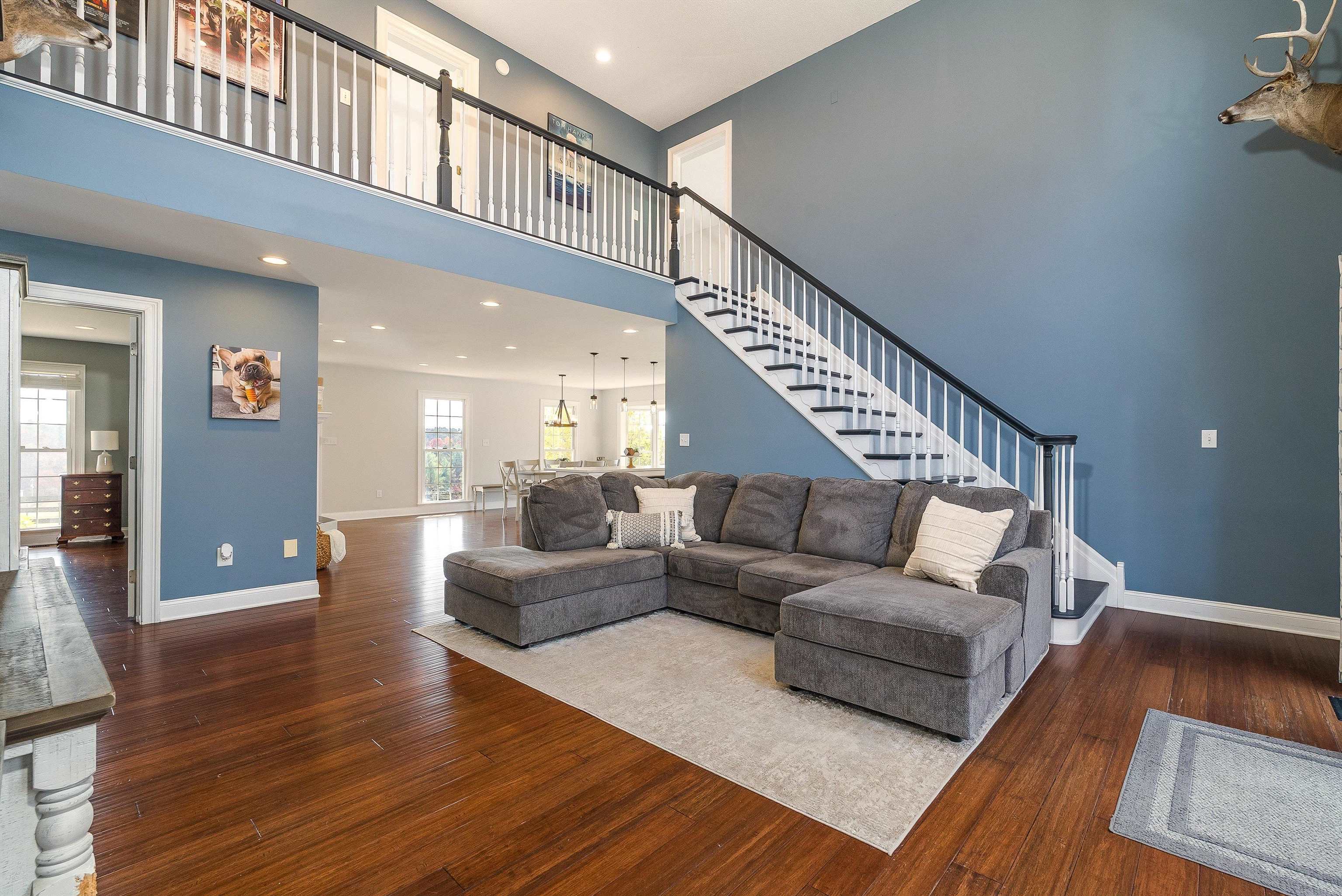 746 Christians Creek Road Staunton, VA 24401 - Photo 38 of 60 a living room with furniture and a ceiling fan
