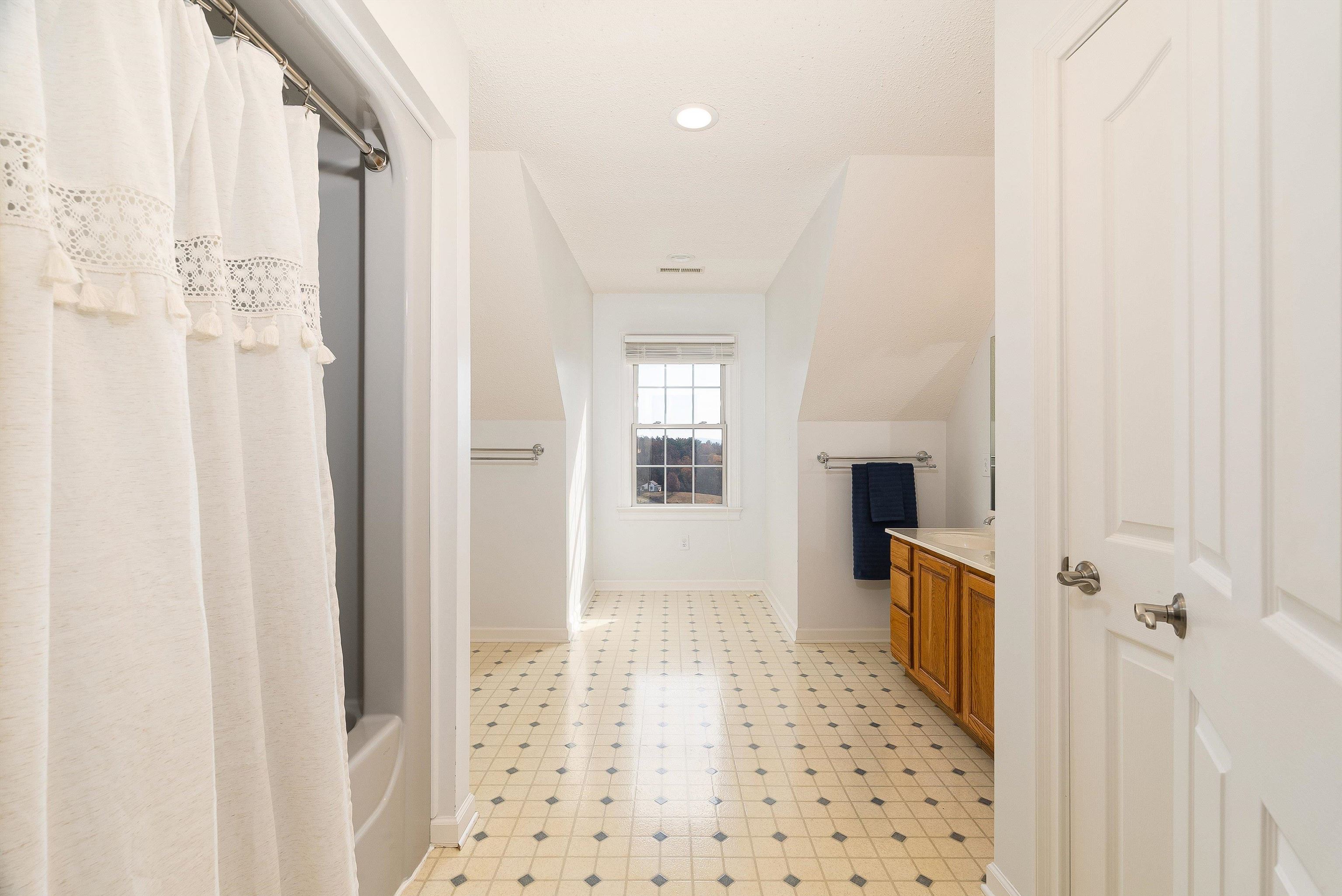 746 Christians Creek Road Staunton, VA 24401 - Photo 42 of 60 a bathroom with a shower and a sink