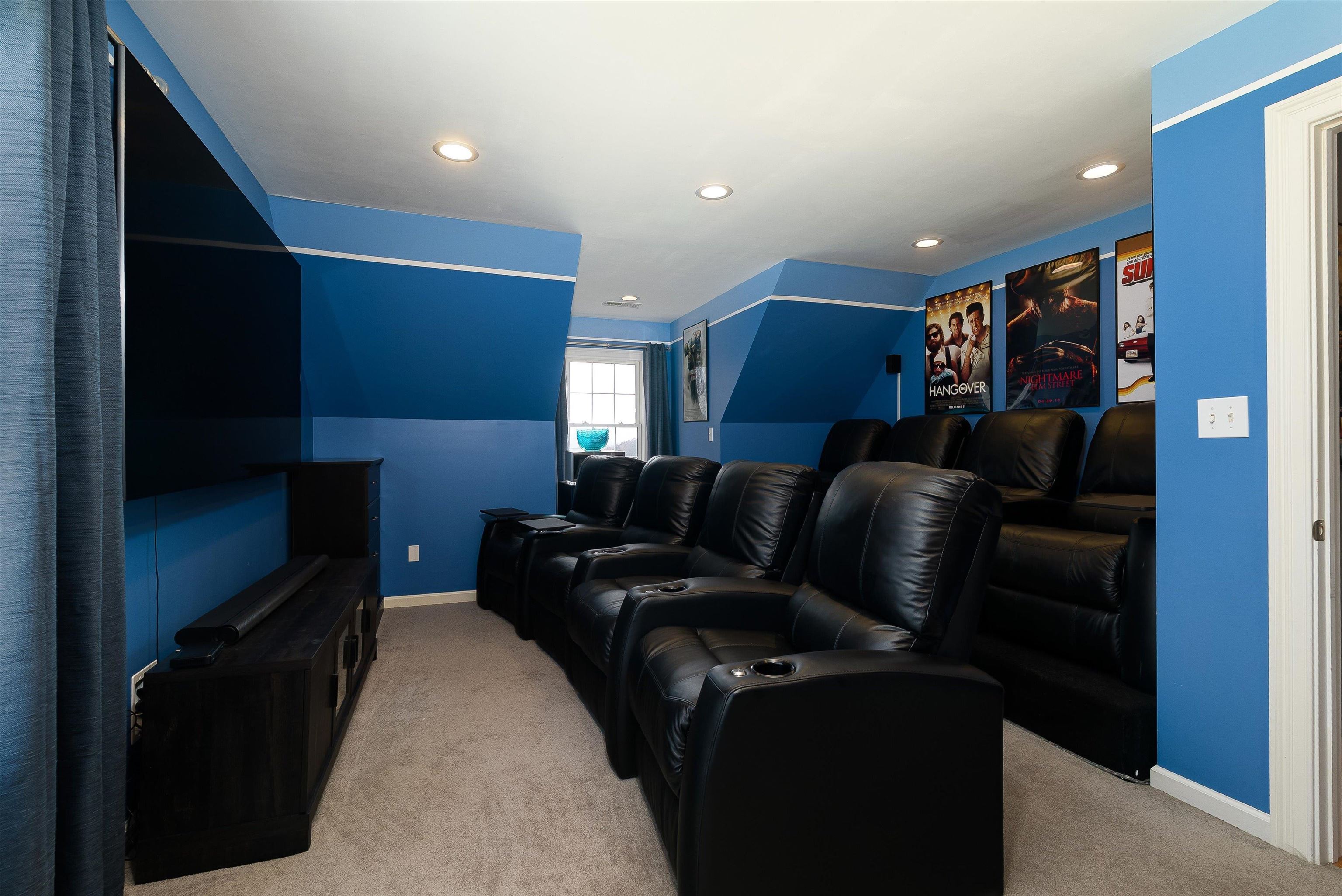 746 Christians Creek Road Staunton, VA 24401 - Photo 44 of 60 a living room with furniture and a projector