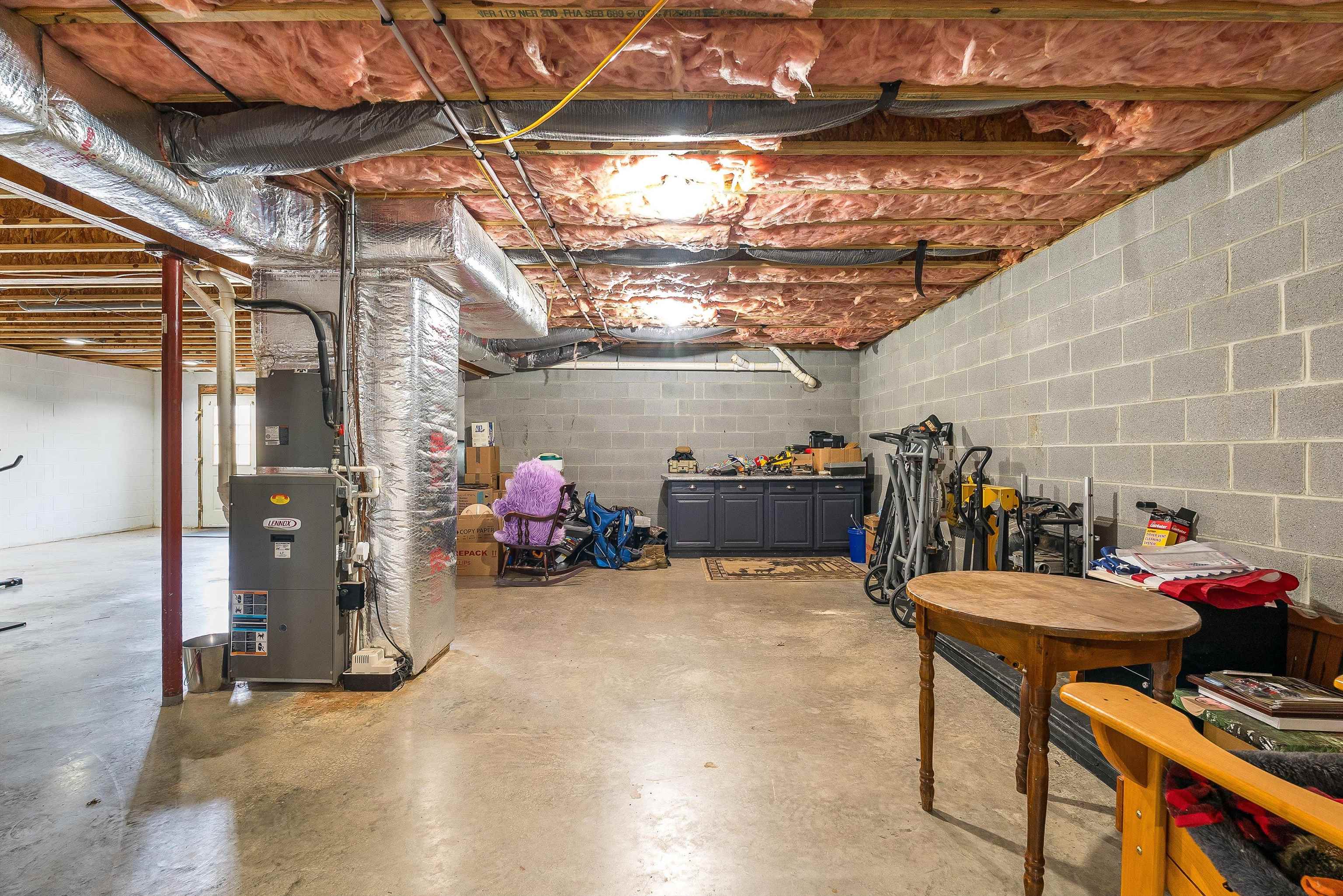 746 Christians Creek Road Staunton, VA 24401 - Photo 50 of 60 a view of a garage with a white car parked