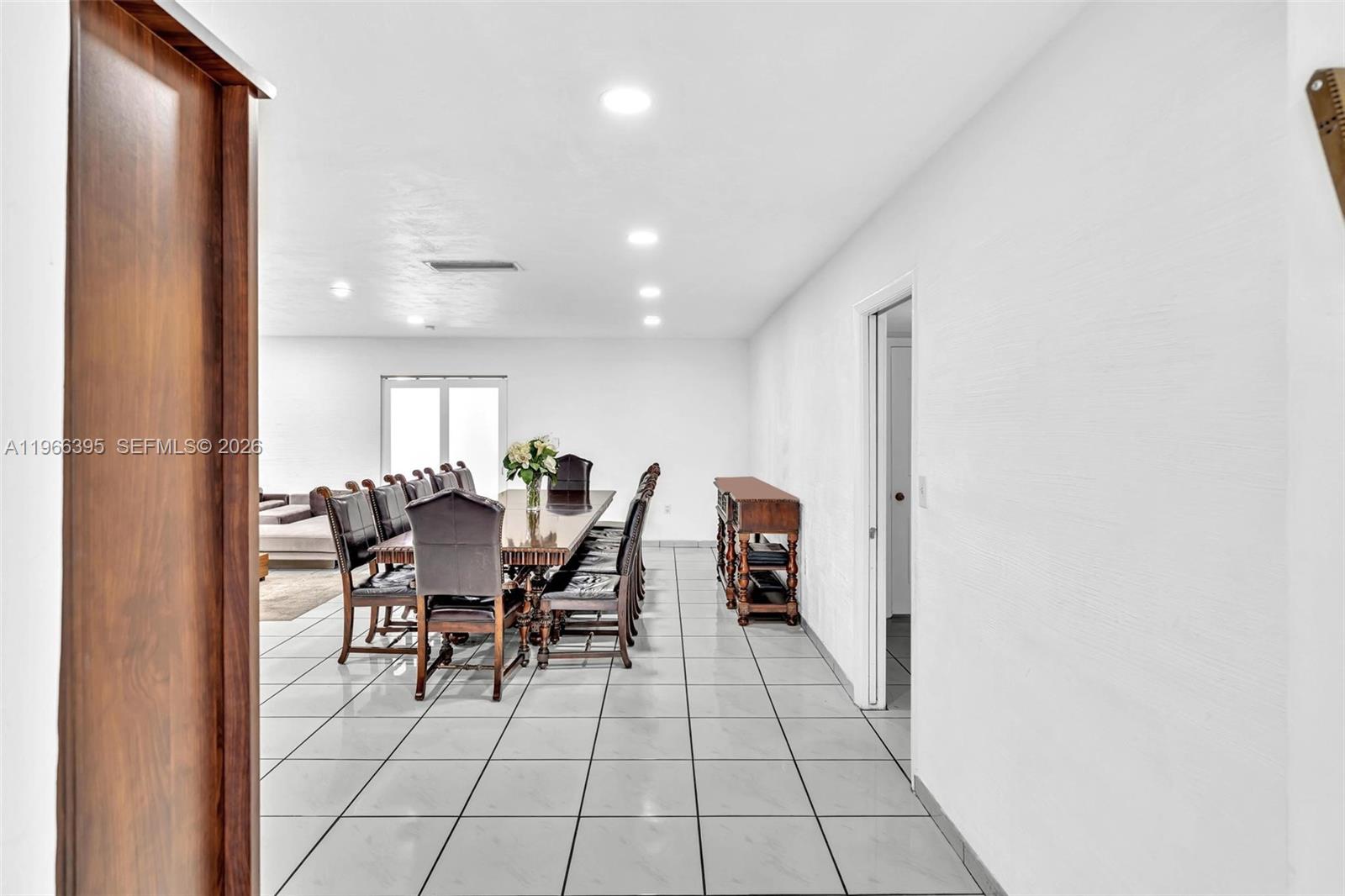 9524 Byron Avenue Surfside, FL 33154 - Photo 20 of 53 a view of a dining room with furniture