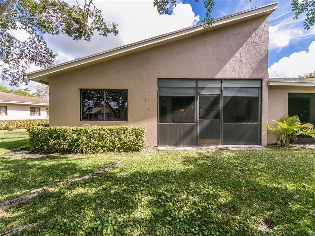 679 Racquet Club Road, Unit 4 Weston, FL 33326 - Photo 3 of 35 a view of front door and yard