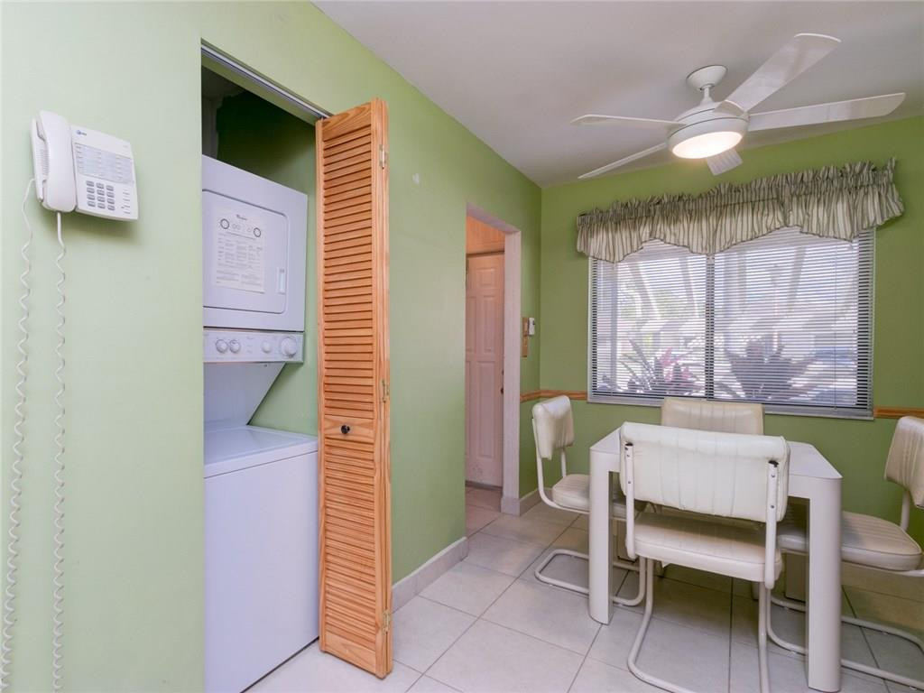 679 Racquet Club Road, Unit 4 Weston, FL 33326 - Photo 8 of 35 a bedroom with a bed and a window