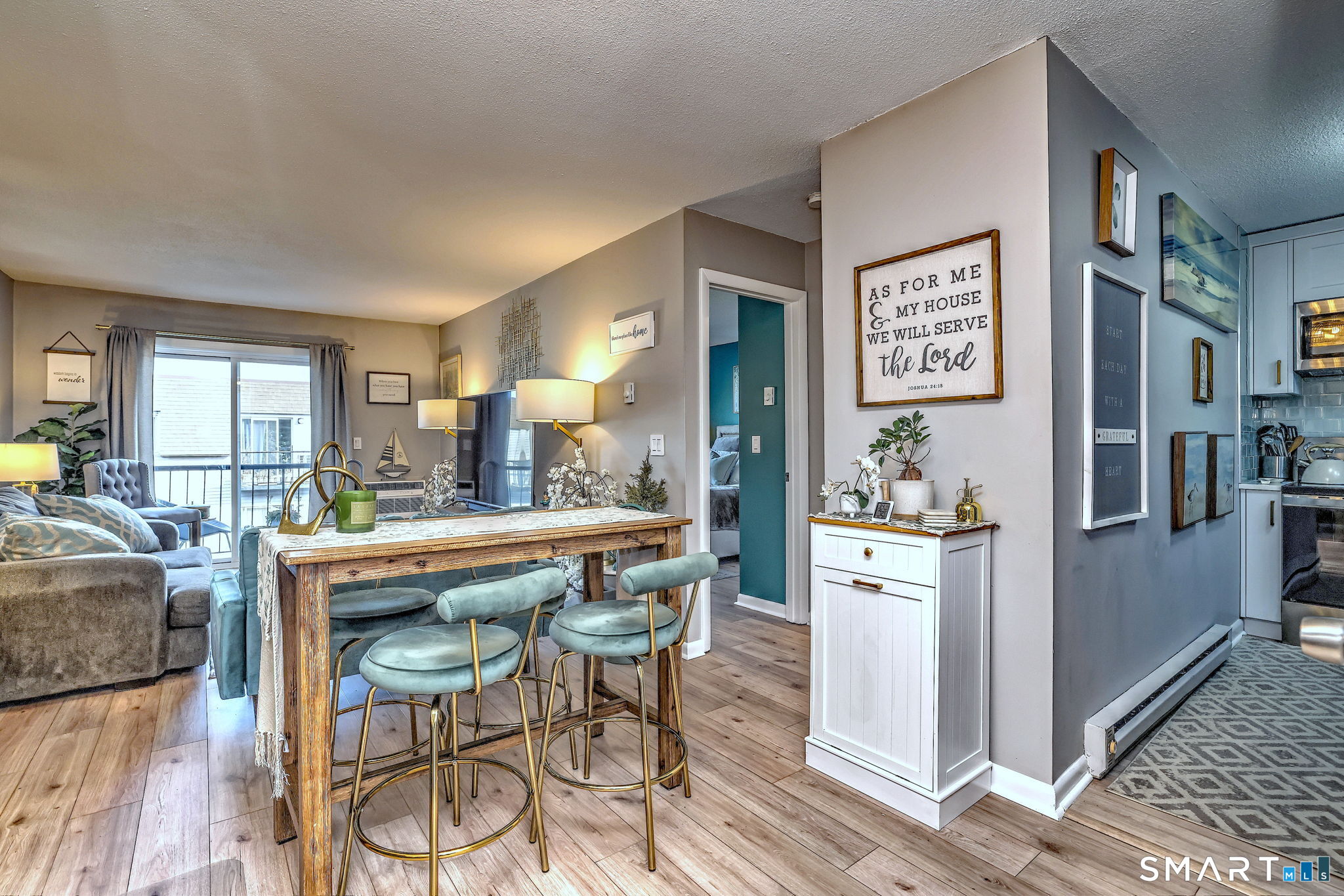 155 Short Beach Road, Unit 304 Stratford, CT 06615 - Photo 12 of 37 a dining hall with stainless steel appliances granite countertop a refrigerator and a stove top oven