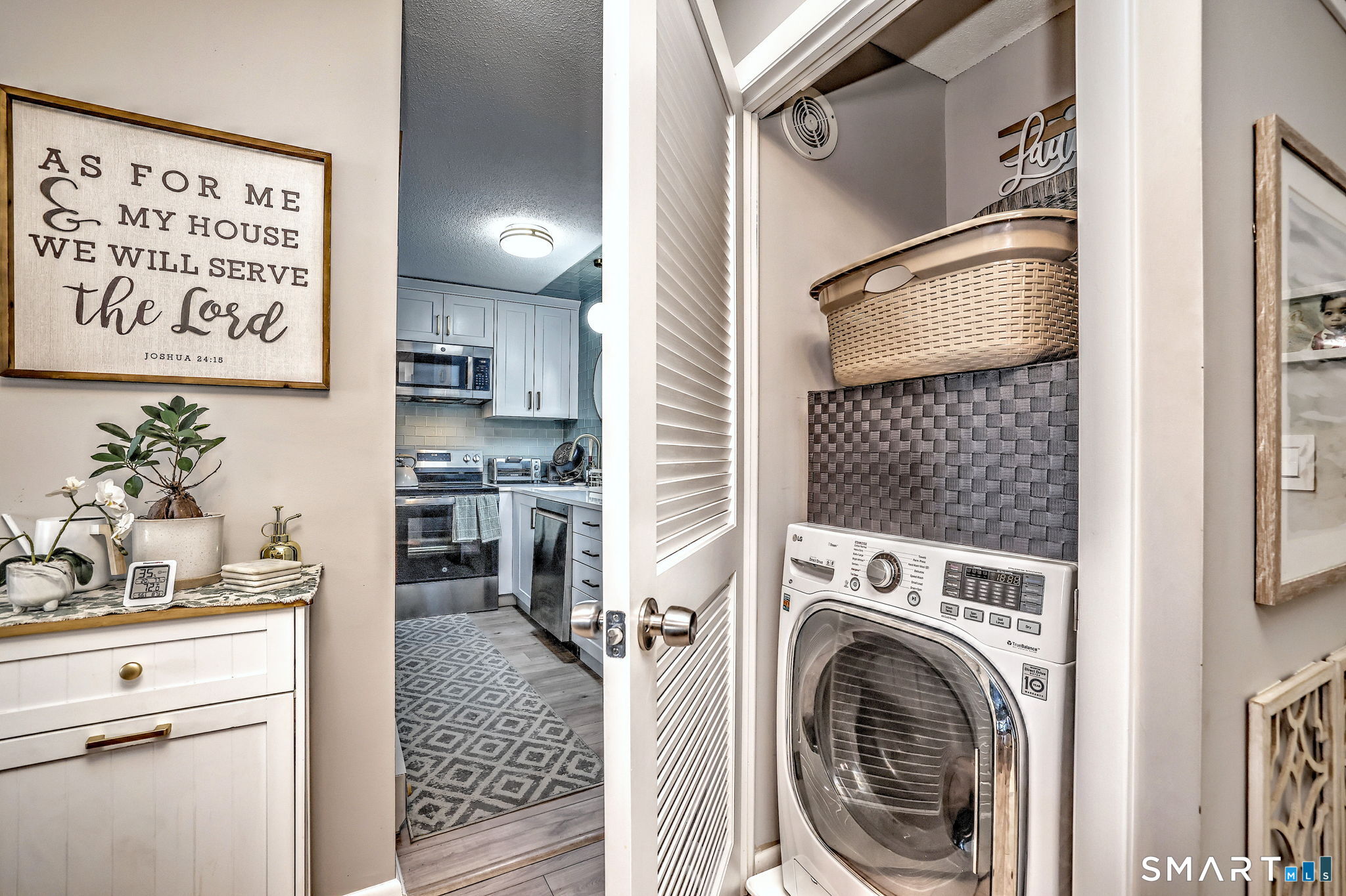 155 Short Beach Road, Unit 304 Stratford, CT 06615 - Photo 17 of 37 a view of a kitchen with a sink dryer and washer