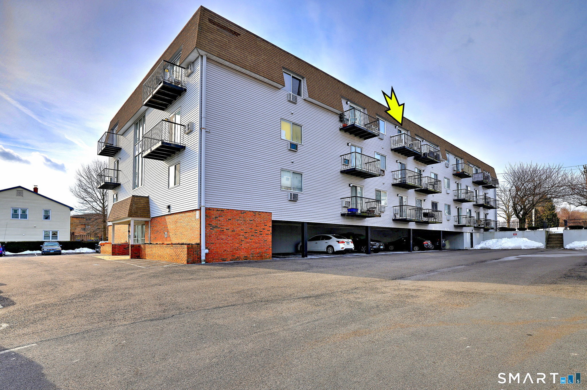 155 Short Beach Road, Unit 304 Stratford, CT 06615 - Photo 25 of 37 a view of a building with a street