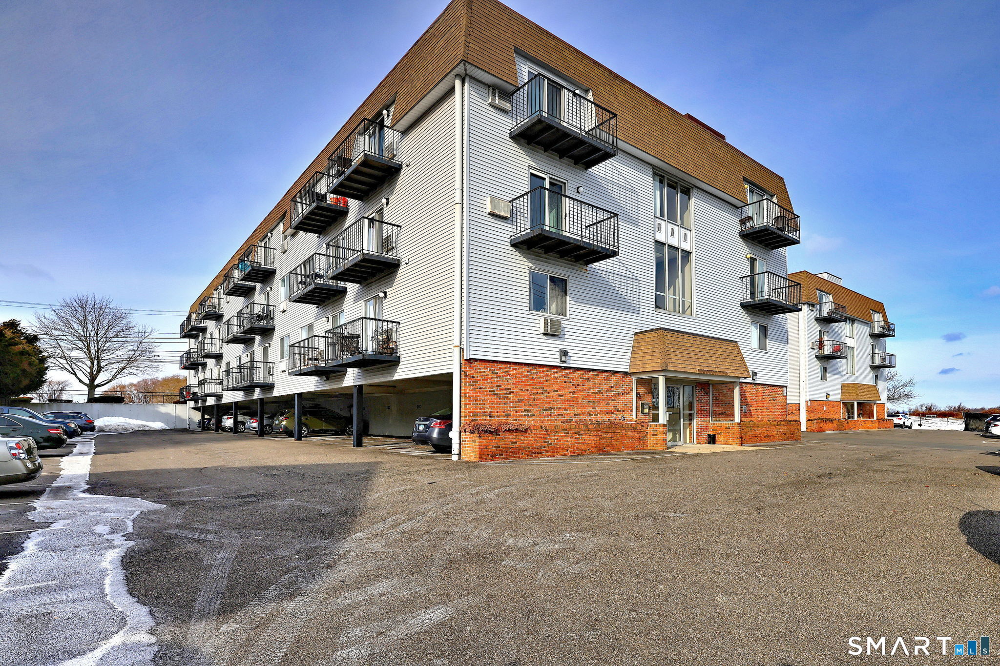 155 Short Beach Road, Unit 304 Stratford, CT 06615 - Photo 4 of 37 an outdoor space with seating