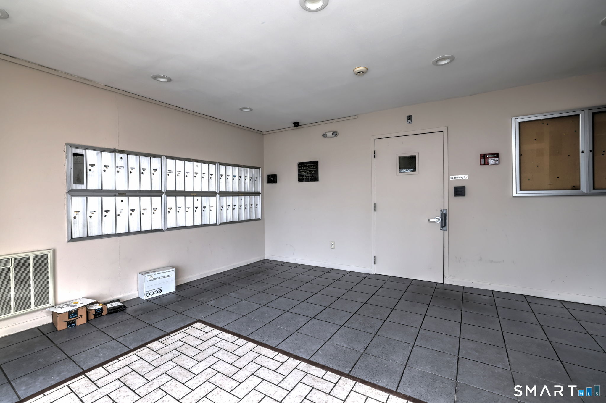 155 Short Beach Road, Unit 304 Stratford, CT 06615 - Photo 5 of 37 a view of an empty room with a window