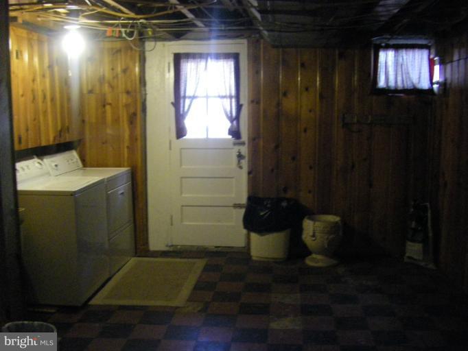 8429 Pleasant Plains Road Towson, MD 21286 - Photo 15 of 17 a bathroom with a shower and a sink