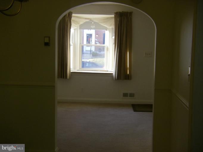 8429 Pleasant Plains Road Towson, MD 21286 - Photo 5 of 17 a room that has a window in it