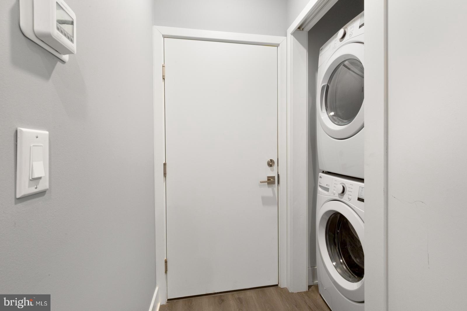 2119 North Front Street, Unit 101 Philadelphia, PA 19122 - Photo 19 of 23 a utility room with dryer and washer