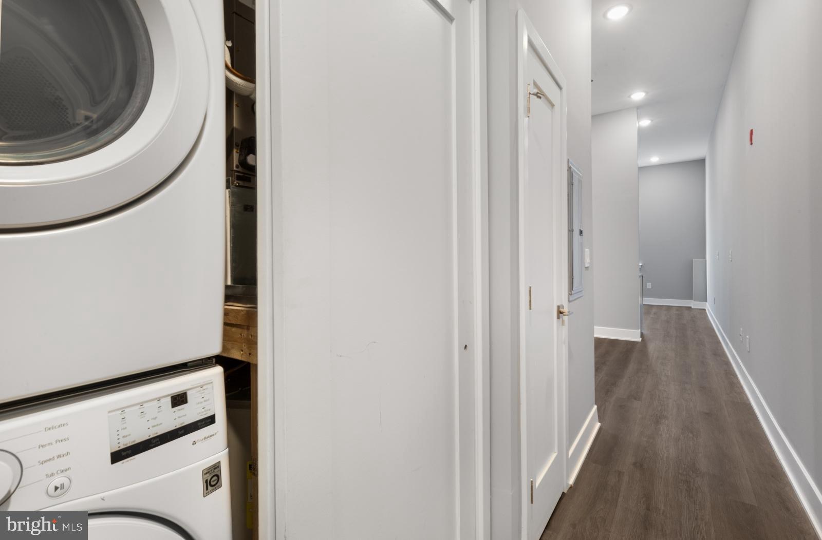 2119 North Front Street, Unit 101 Philadelphia, PA 19122 - Photo 10 of 23 a view of a hallway with washer and dryer