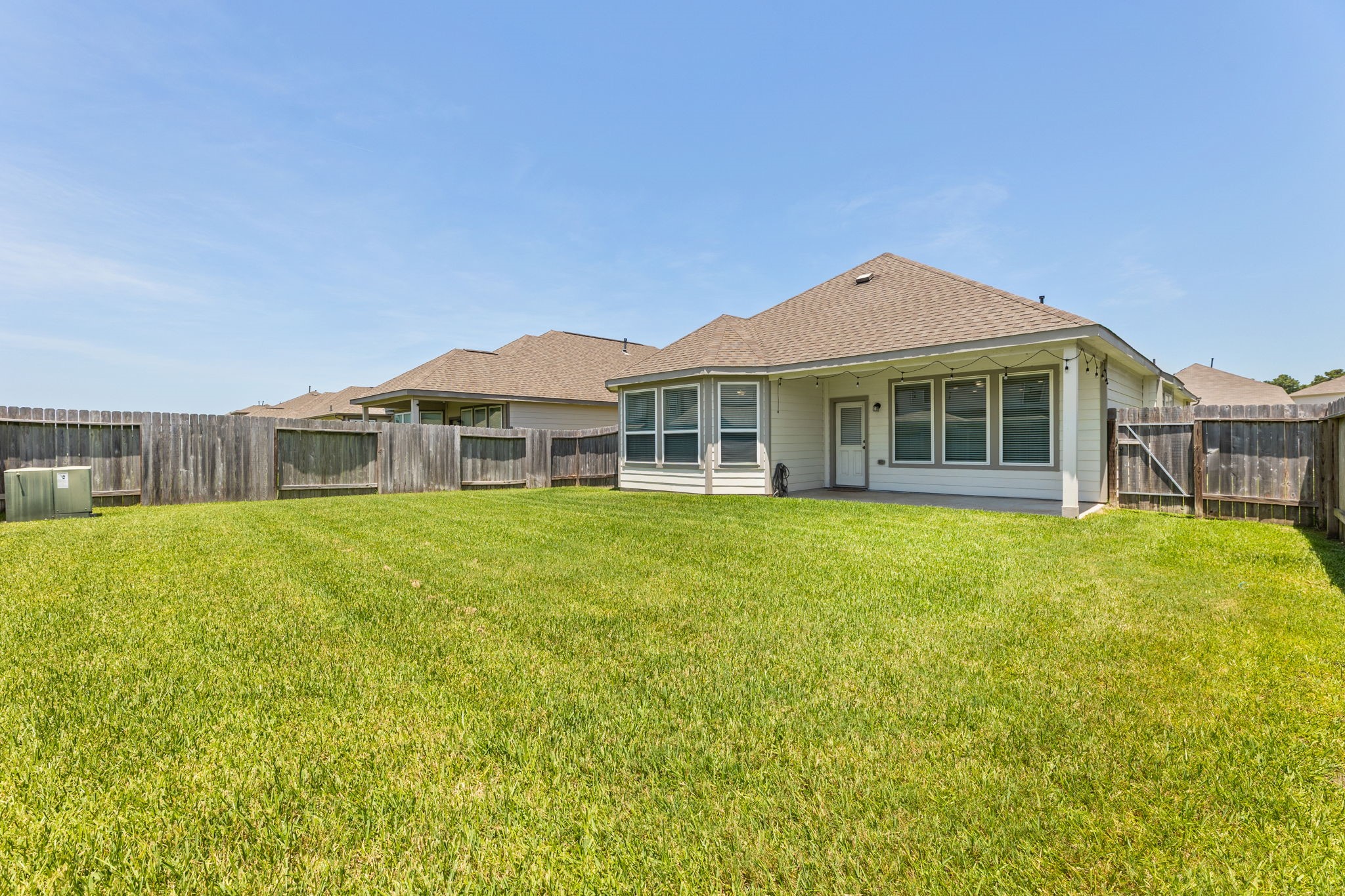 17515 Harbourfront Road Humble, TX 77346 - Photo 35 of 36 Backyard with Room to Entertain