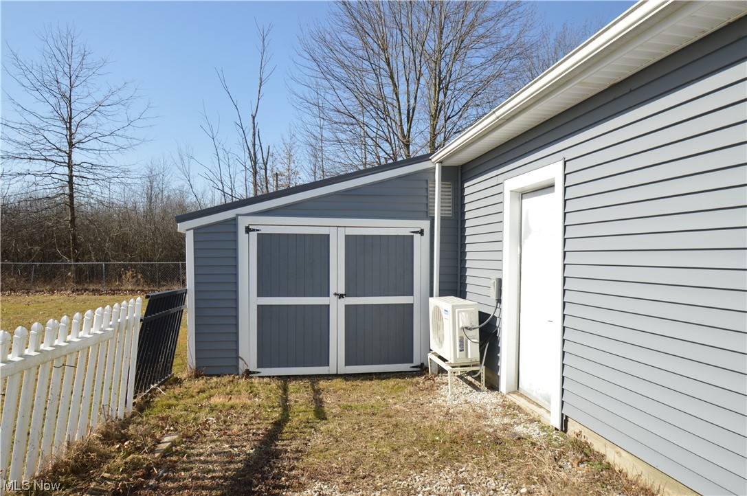 5928 Stow Road Hudson, OH 44236 - Photo 26 of 35 Storage shed attached to outbuilding.