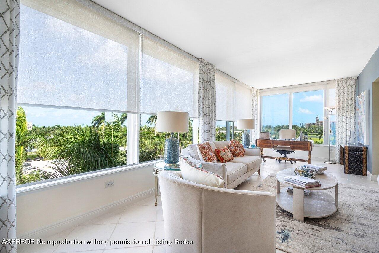 44 Cocoanut Row, Unit 505B Palm Beach, FL 33480 - Photo 3 of 14 a living room with furniture and a large window