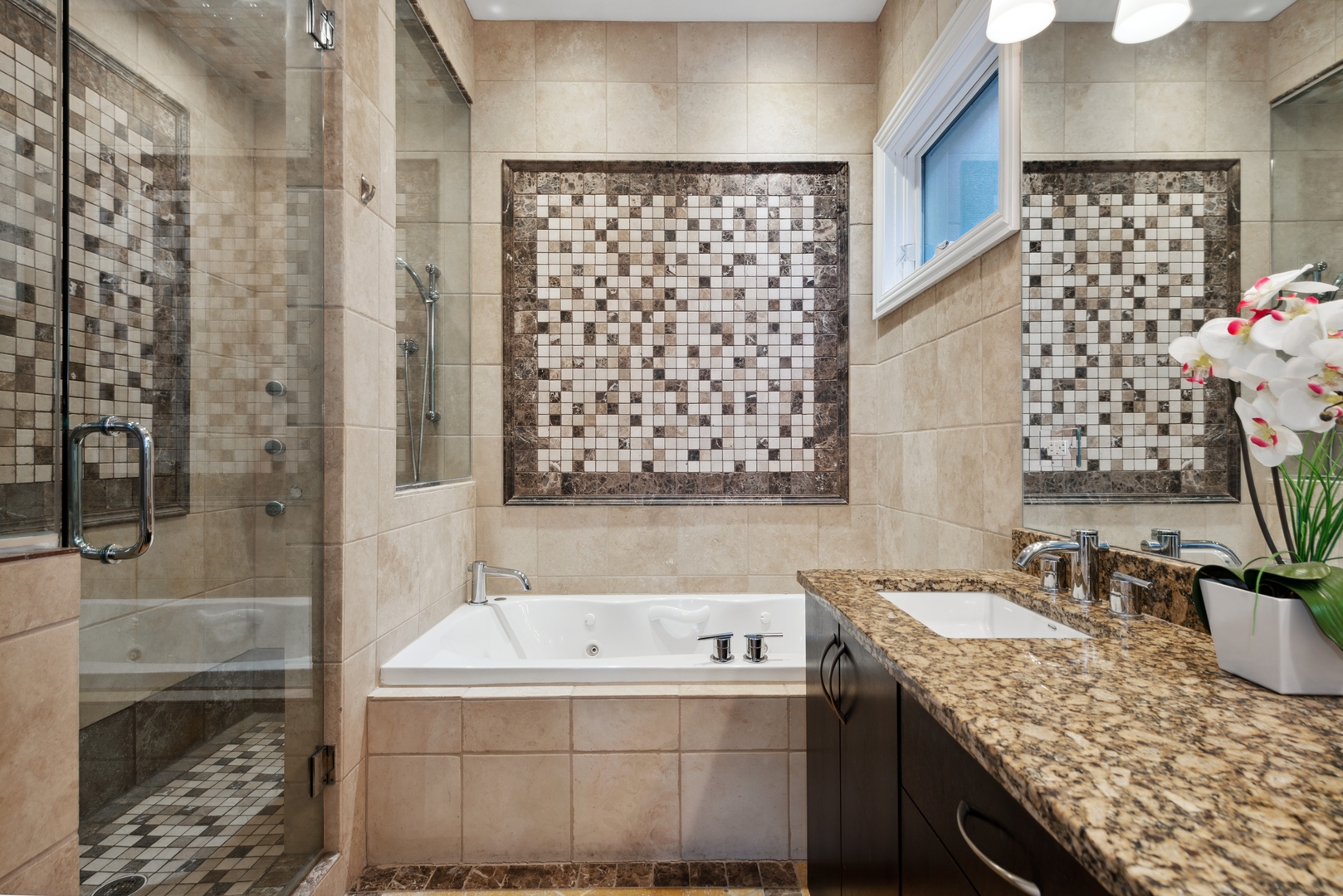 1131 West Addison Street, Unit 2 Chicago, IL 60613 - Photo 15 of 21 a bathroom with a granite countertop sink a toilet and shower