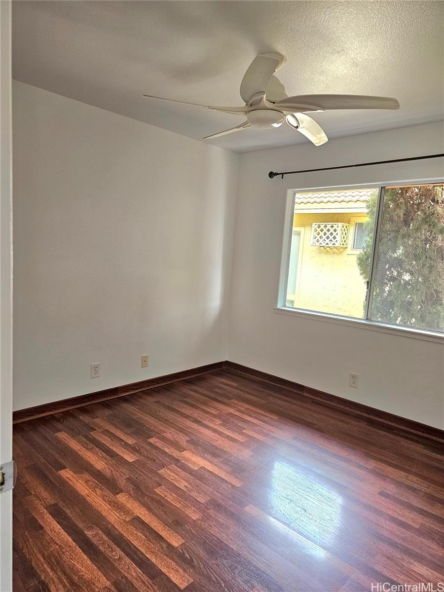 91-1040 Kanihaalilo Street Kapolei, HI 96707 - Photo 7 of 12 a view of an empty room and window
