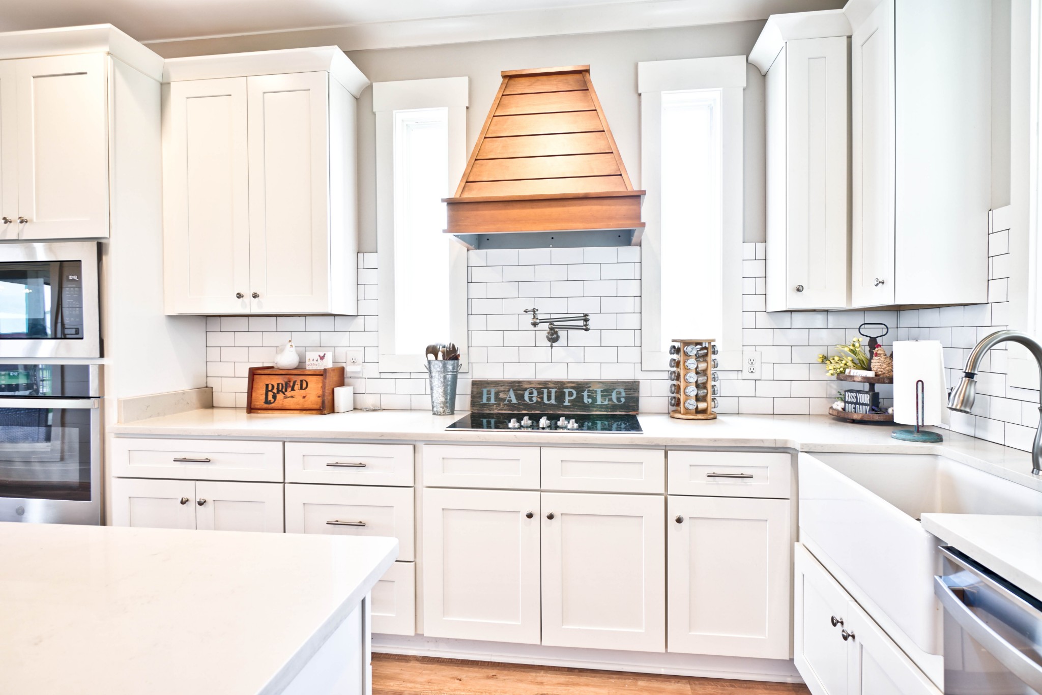 6992 Wayside Road Christiana, TN 37037 - Photo 14 of 44 Check out the pot filler and custom hood range above the cooktop.