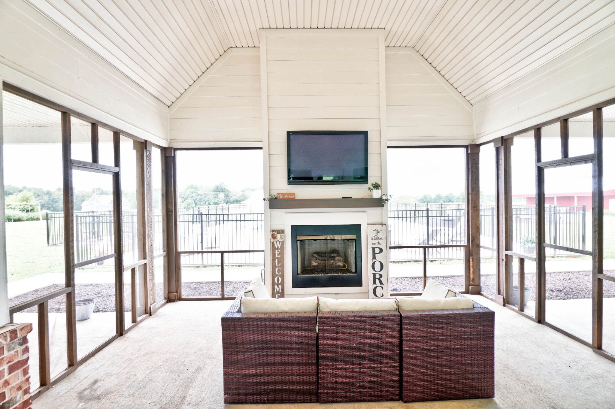 6992 Wayside Road Christiana, TN 37037 - Photo 36 of 44 Huge screened in, covered back porch with a gas burning fireplace, storage closet & vaulted ceiling!