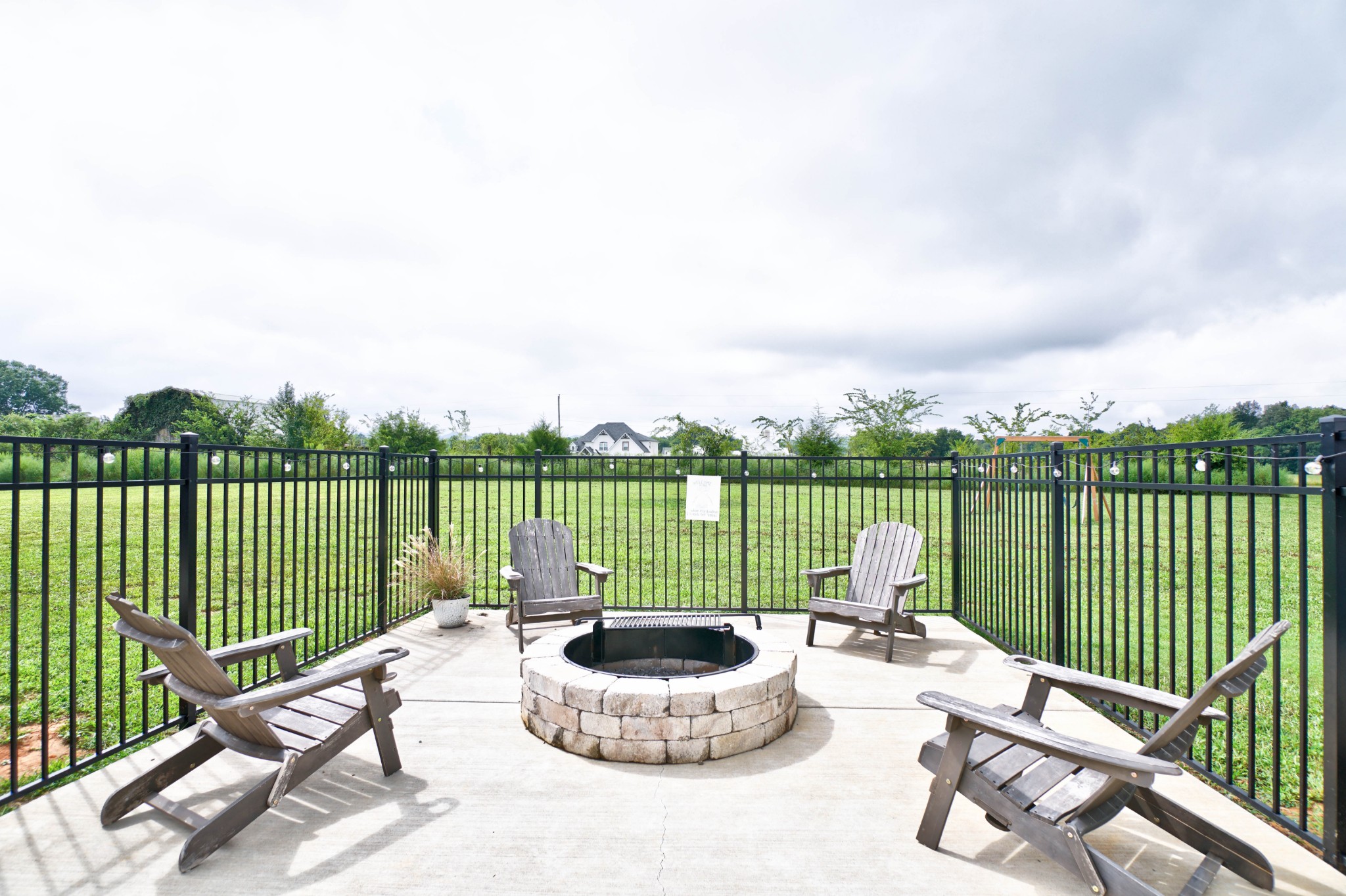 6992 Wayside Road Christiana, TN 37037 - Photo 41 of 44 Custom stacked stoned firepit area to the left on the pool deck.