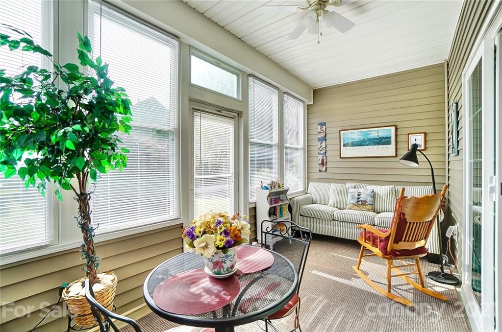 2135 Ashley River Road Waxhaw, NC 28173 - Photo 11 of 17 a living room with furniture and a potted plant