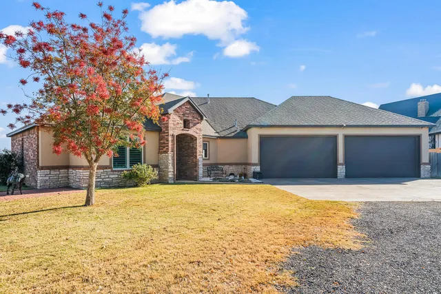 a living room with furniture fireplace and a flat screen tv