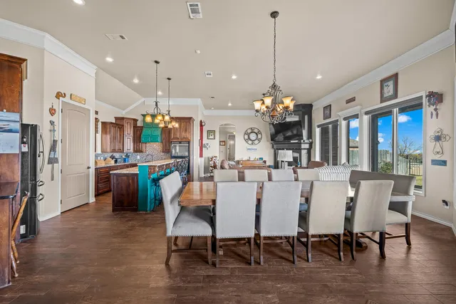 a bed room with a bed and a television