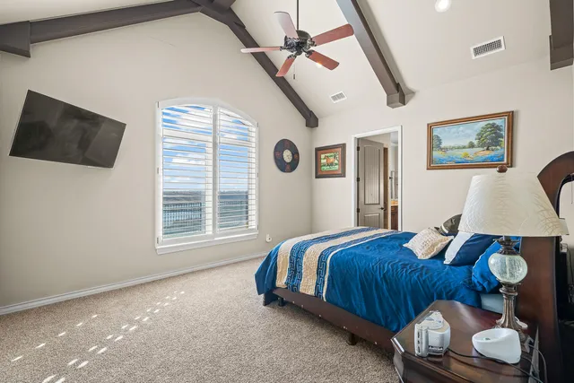 a view of a hallway with wooden shelves