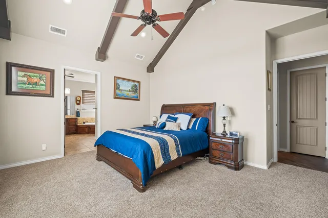 a view of a hallway with washer and dryer
