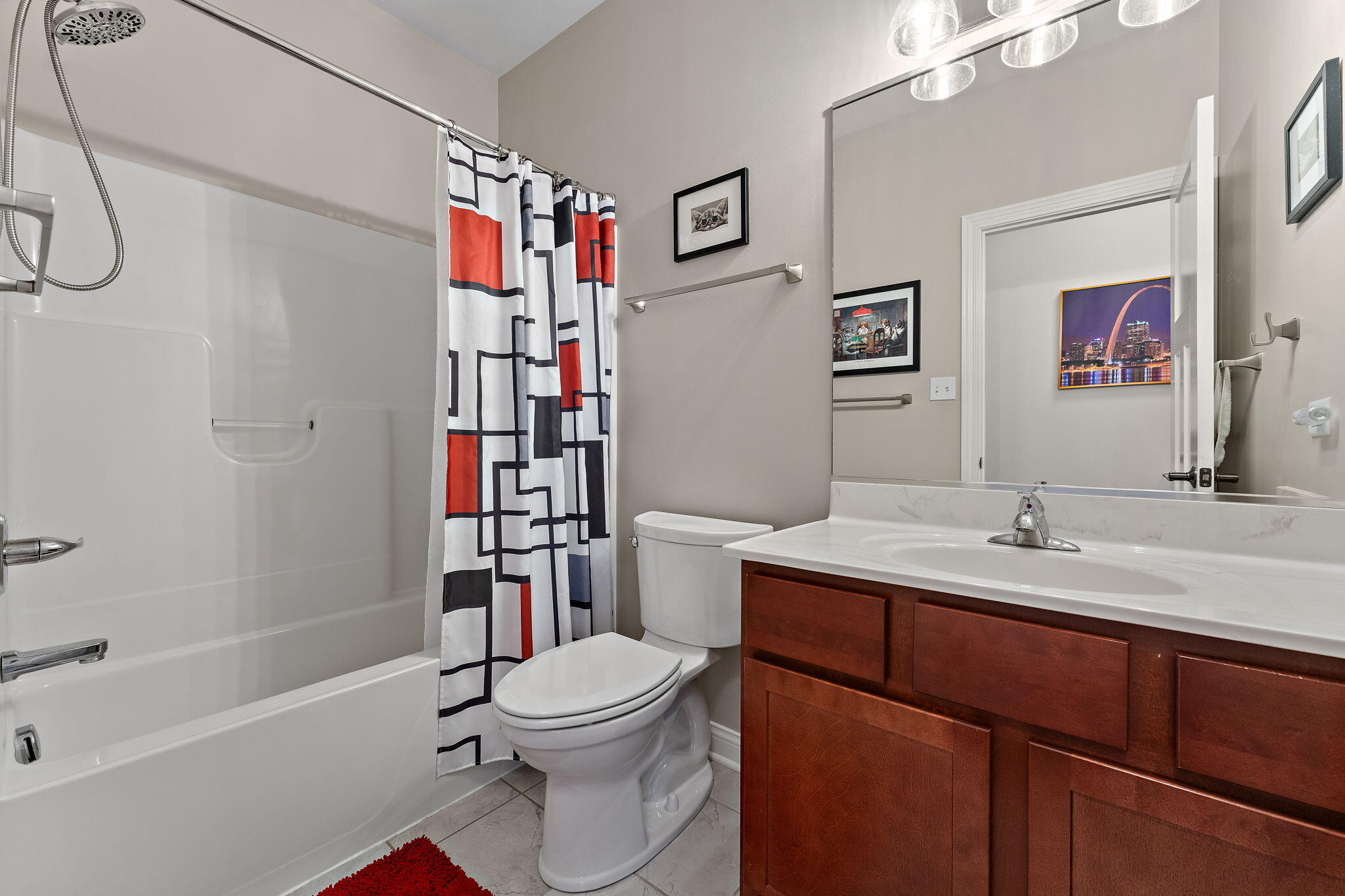 10138 Privet Drive Crown Point, IN 46307 - Photo 19 of 39 a bathroom with a sink a toilet and shower