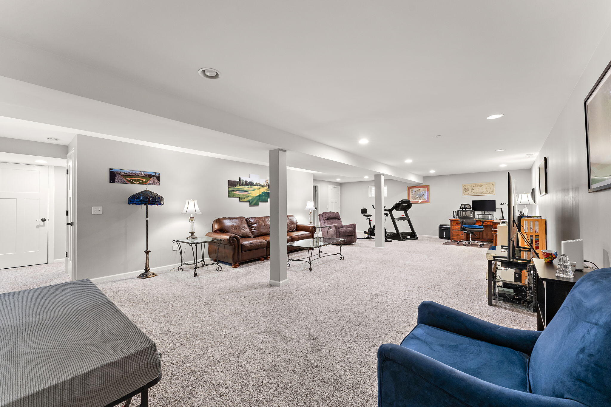 10138 Privet Drive Crown Point, IN 46307 - Photo 22 of 39 a living room with furniture and couches with kitchen view