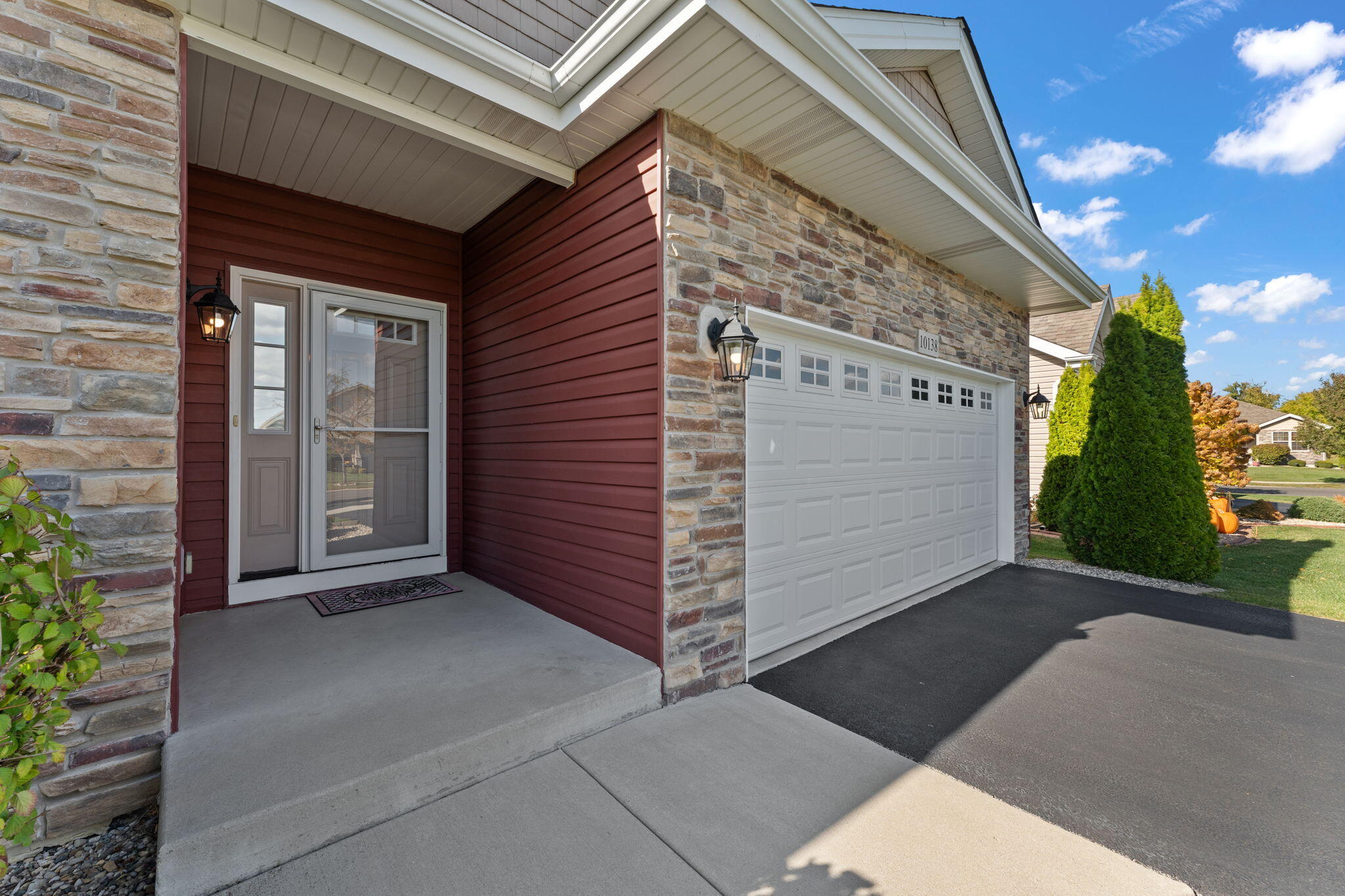 10138 Privet Drive Crown Point, IN 46307 - Photo 35 of 39 a view of yellow house with a large windows