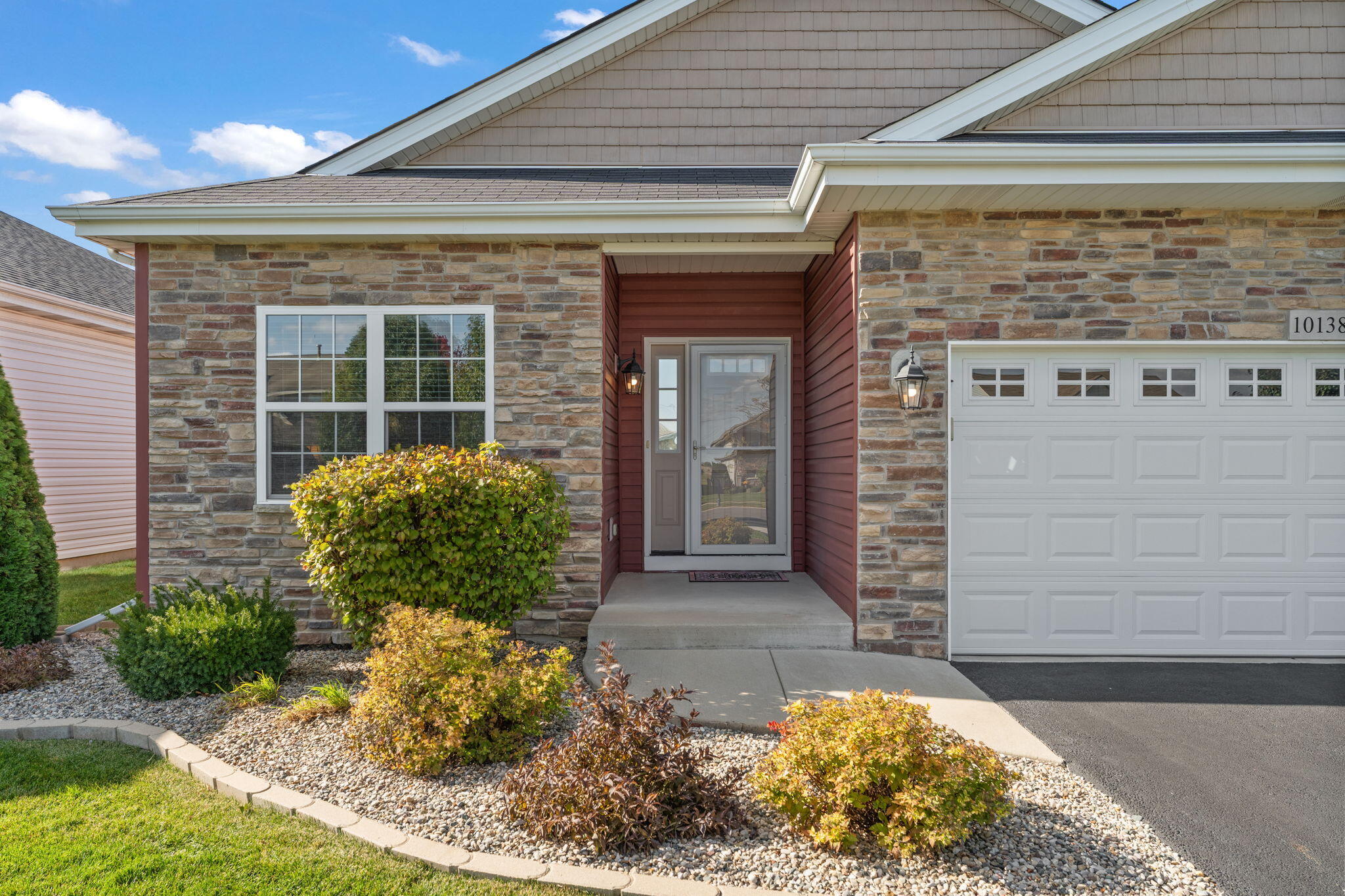 10138 Privet Drive Crown Point, IN 46307 - Photo 38 of 39 a front view of a house with garden