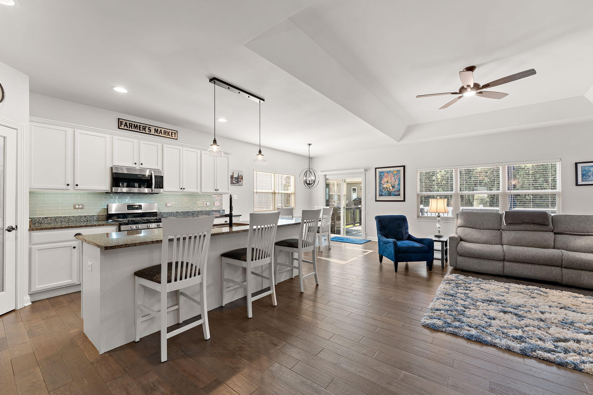 10138 Privet Drive Crown Point, IN 46307 - Photo 5 of 39 a living room with stainless steel appliances furniture and a view of kitchen