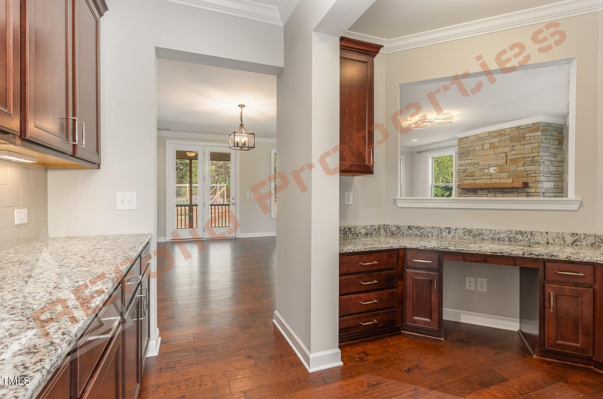 1001 Covered Bridge Trail Chapel Hill, NC 27517 - Photo 11 of 41 a view of a kitchen cabinets and a wooden floor