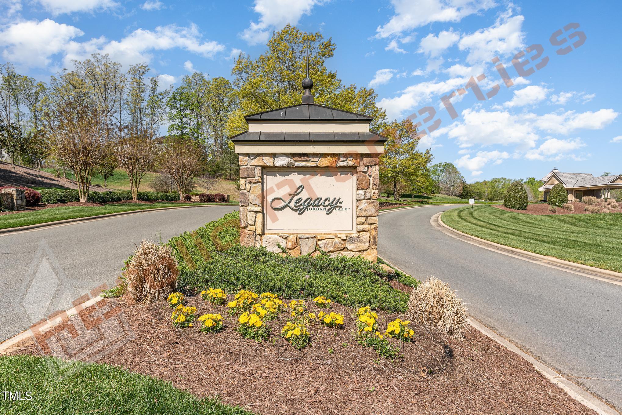 1001 Covered Bridge Trail Chapel Hill, NC 27517 - Photo 32 of 41 a view of a street with a large tree